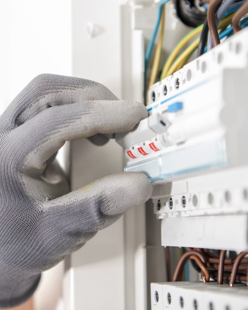 electrician-testing-fuses-in-the-electric-box-2023-11-27-05-32-21-utc electrician-testing-fuses-in-the-electric-box-2023-11-27-05-32-21-utc